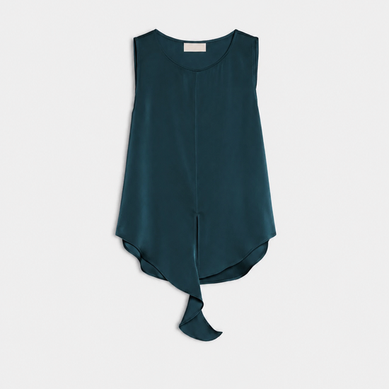 A sleeveless dark teal top with a high-low asymmetrical hem and a tied skirt detail, displayed flat against a light gray background.