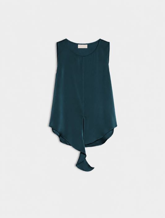 A sleeveless dark teal top with a high-low asymmetrical hem and a tied skirt detail, displayed flat against a light gray background.