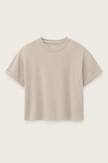 Cement coloured boxy t-shirt on a plain background