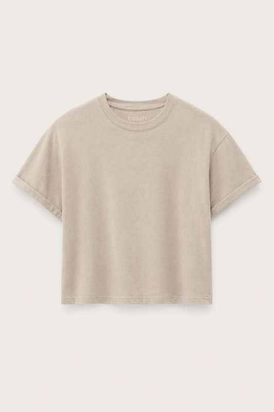 Cement coloured boxy t-shirt on a plain background