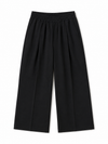 Black wide-leg trousers on a white background