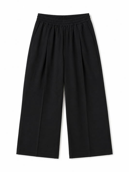 Black wide-leg trousers on a white background