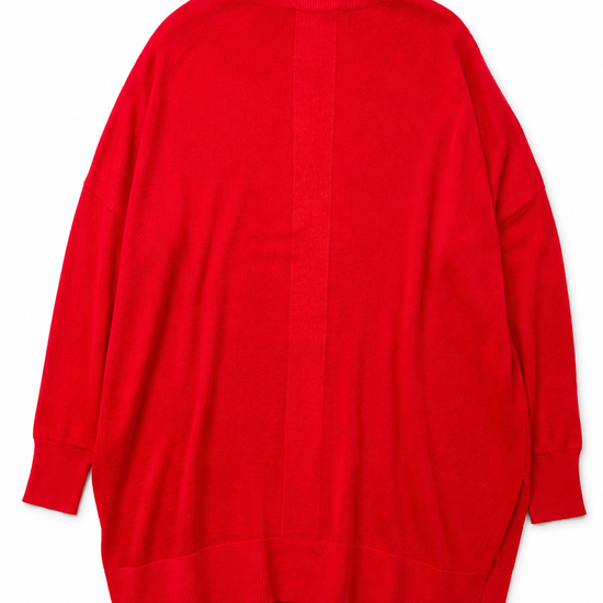 Back of red boxy turtleneck knit on a white background 