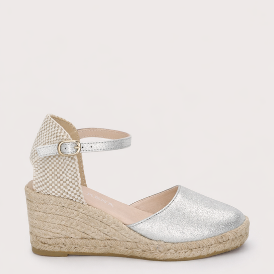 silver espadrille on a light background