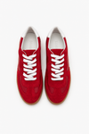 Red sneakers with white laces on a white background