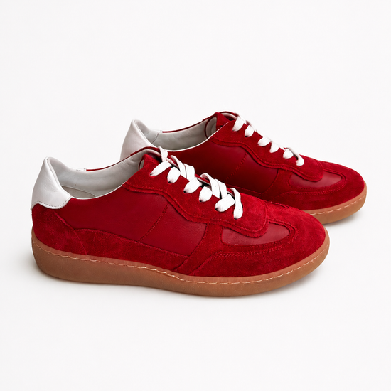 Red sneakers on a white background