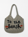 Striped tote bag with 'To the Beach' text on a white background