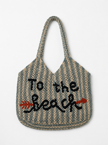 Striped tote bag with 'To the Beach' text on a white background