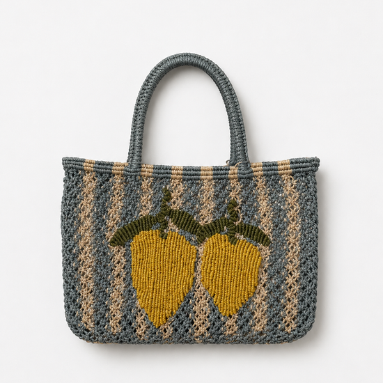 Woven bag with lemon design on a white background