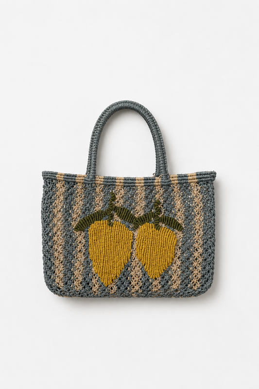 Woven bag with lemon design on a white background