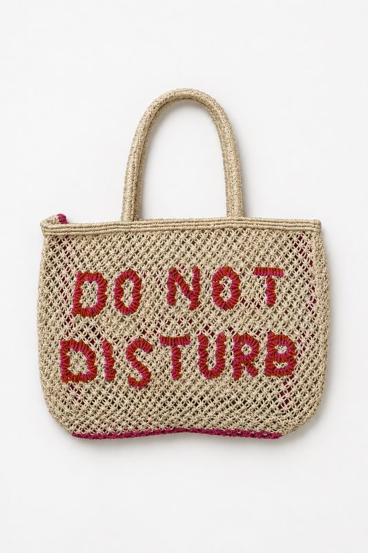 Woven bag with ink slogan on a white background