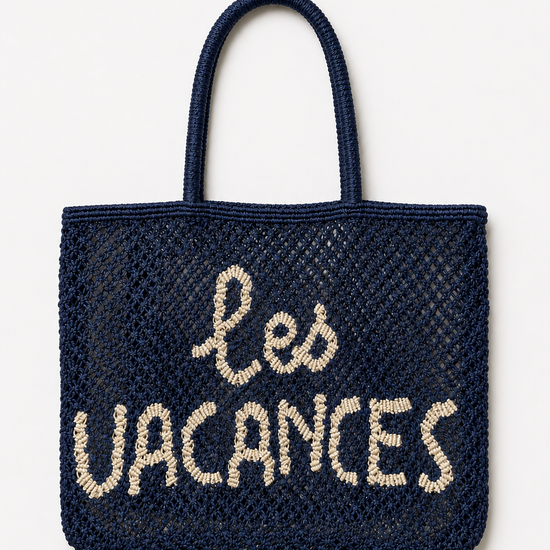 Woven navy bag with a slogan on it on a white background