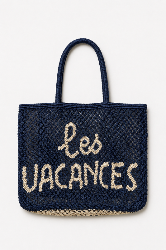 Woven navy bag with a slogan on it on a white background