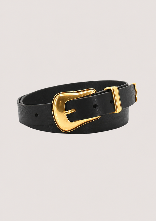 Black belt with a gold buckle on a light gray background