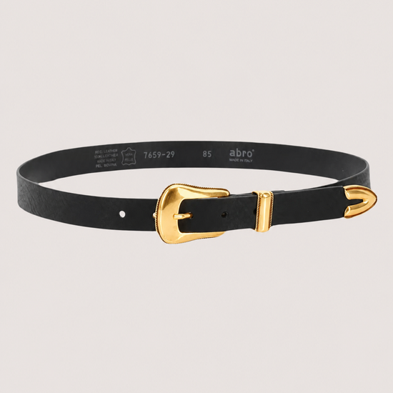 Black belt with a gold buckle on a light gray background