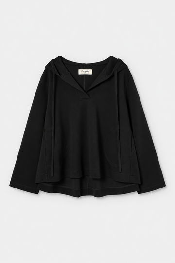 A black long-sleeve hooded top with a draped, layered hem, displayed flat against a light gray background.