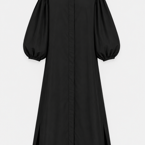 A black long-sleeve midi shirt dress with dramatic balloon sleeves, a pointed collar, and front button closure, shown against a light gray background.