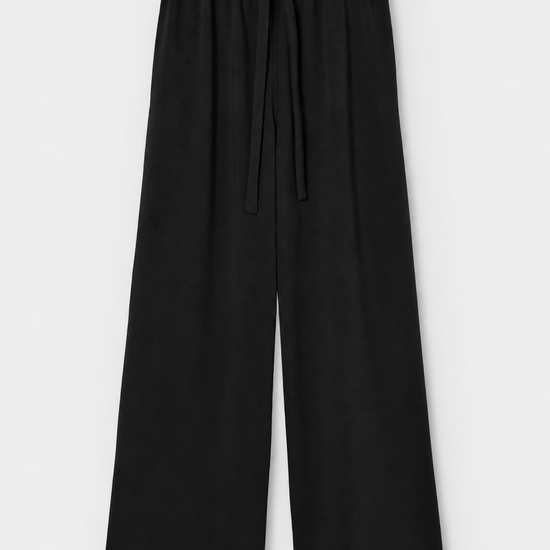 Black wide-leg trousers with an elastic waistband and a matching drawstring, shown flat against a light gray background.