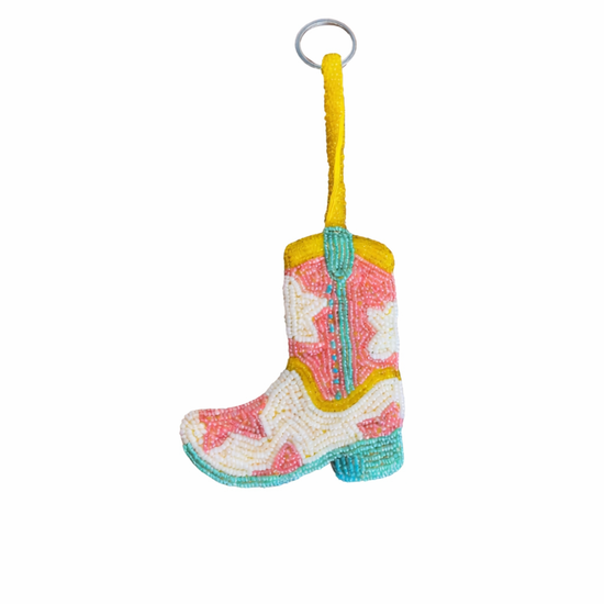 cowboy boot keyring on white background