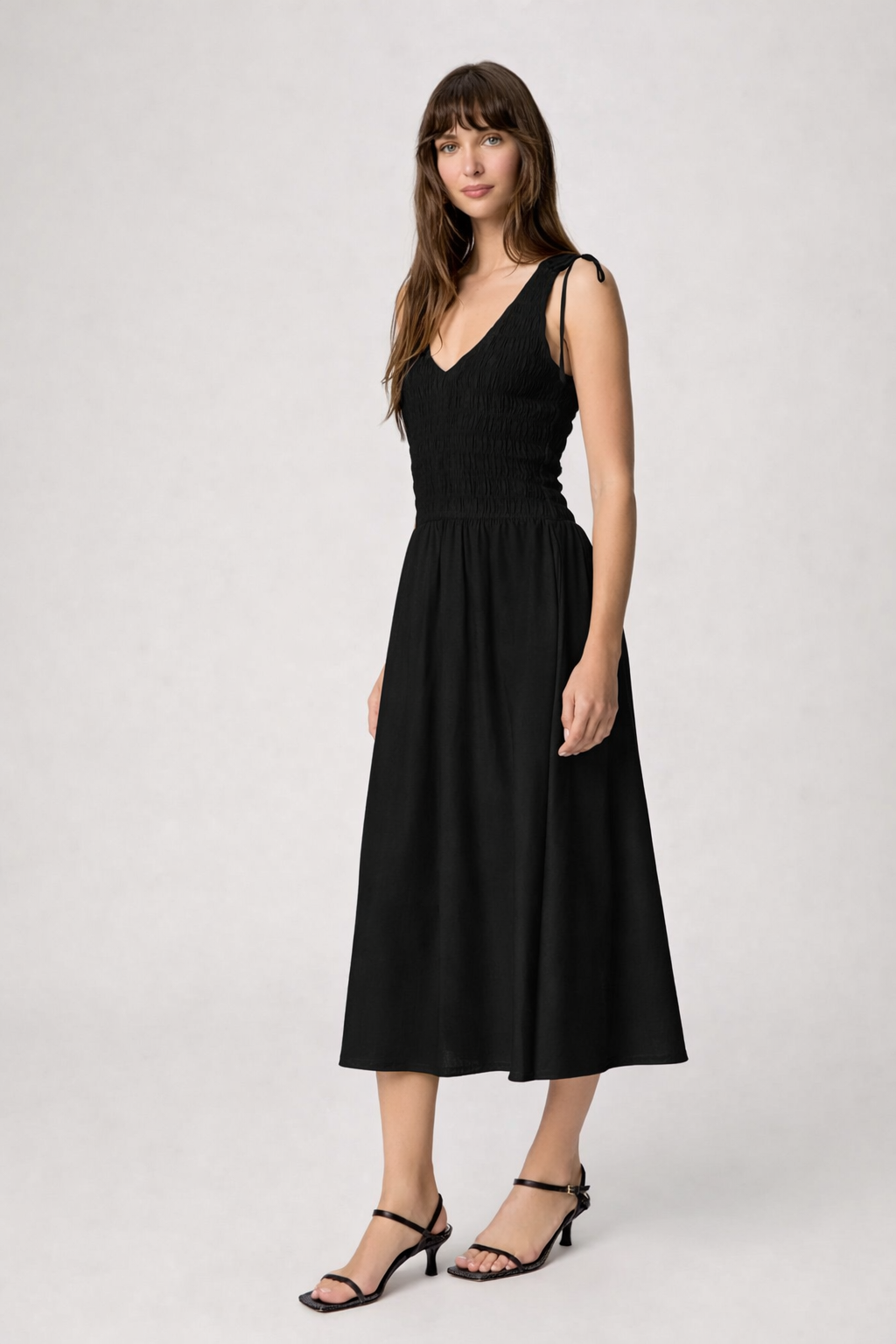 Black summer dress with vest shape top from Paige