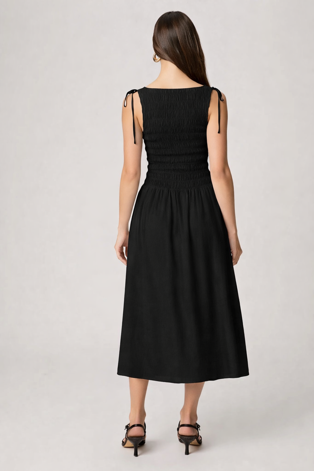 Rear view of black summer dress from paige