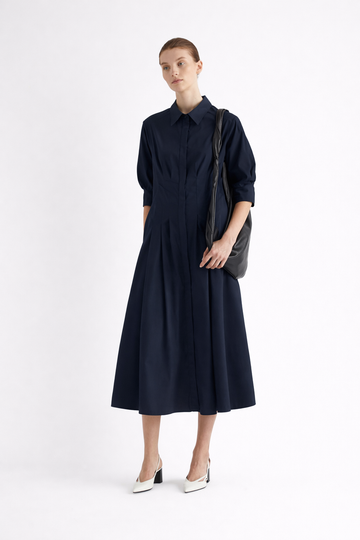 Deep navy cotton shirt dress with full skirt and pleating detail at the waist from Mei meiJ