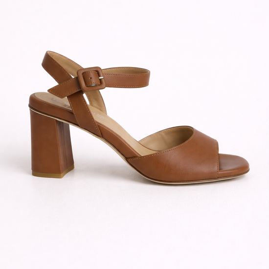 Brown sandal with a block heel on a white background