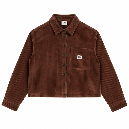 A brown corduroy button-up shirt jacket with a chest pocket and a small white square brand patch on the pocket, displayed flat against a white background.
