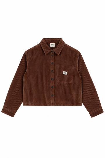 A brown corduroy button-up shirt jacket with a chest pocket and a small white square brand patch on the pocket, displayed flat against a white background.