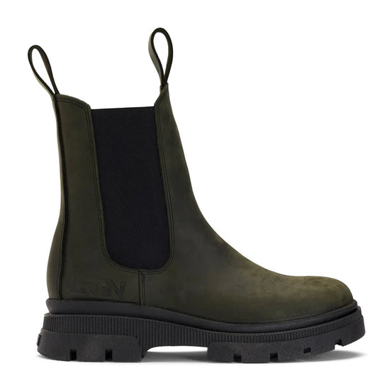 green waterproof chelsea boot with black rubber sole and pull on tabs