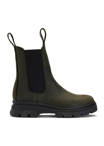green waterproof chelsea boot with black rubber sole and pull on tabs
