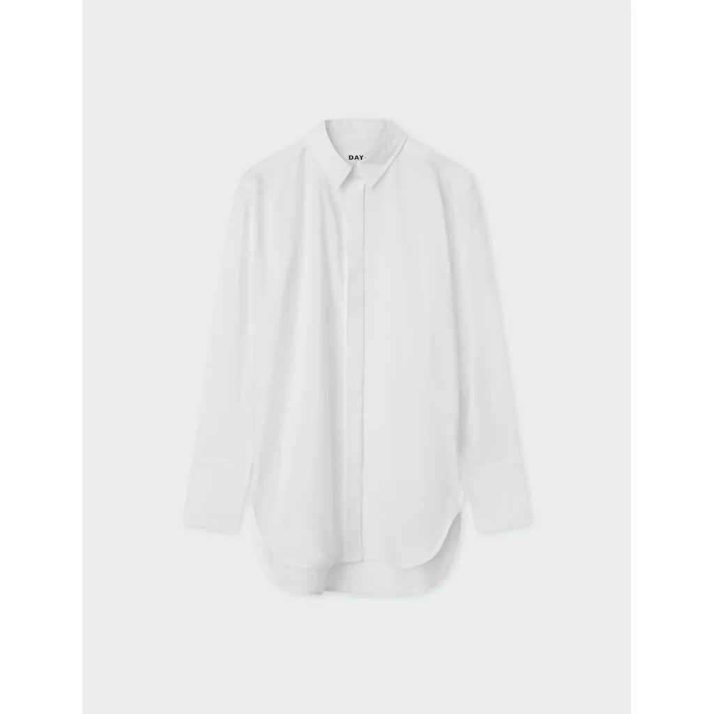Oversized white shirt with curved dipped hem with long sleeves and covered placket