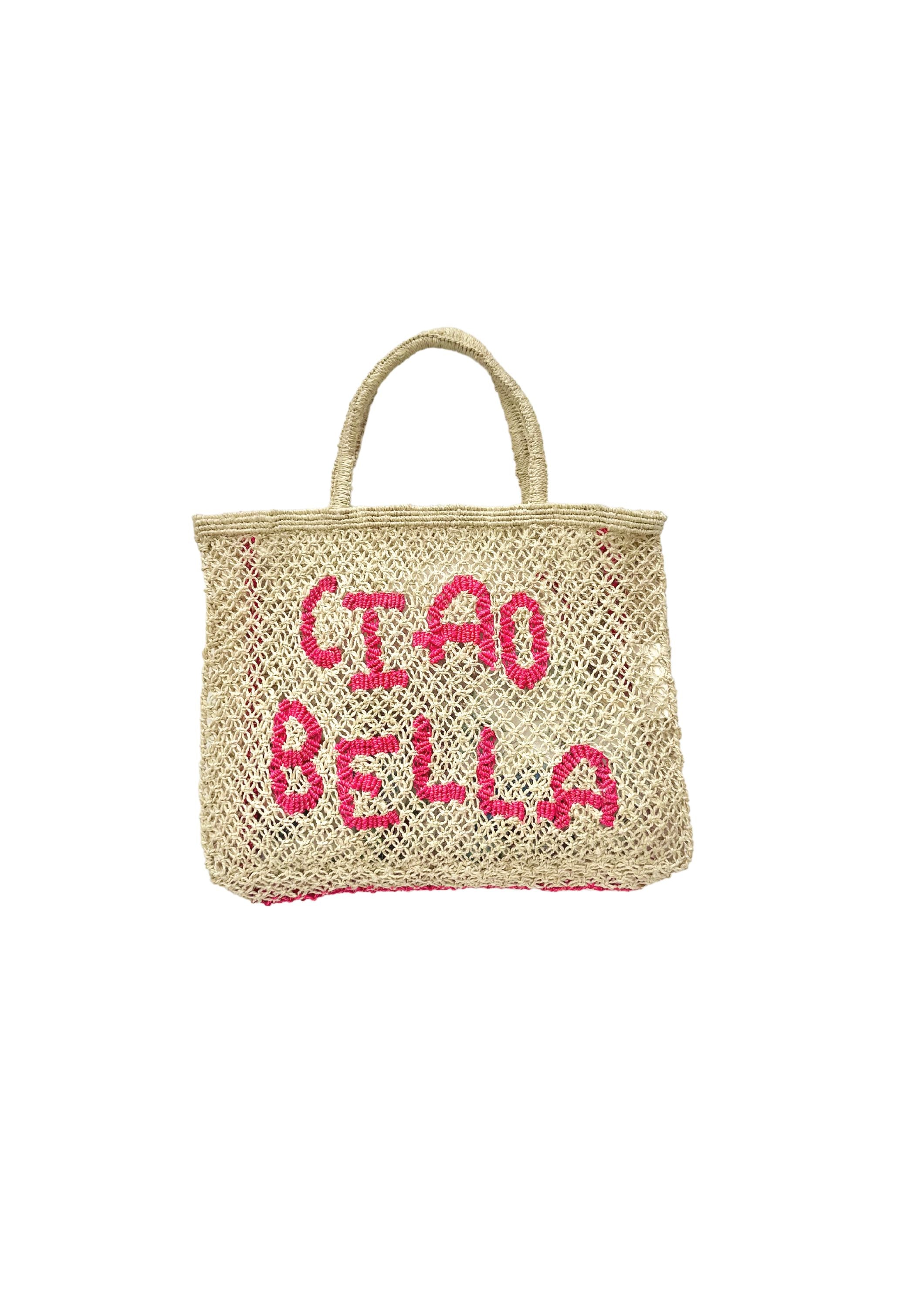 Woven Bag with pink writing saying Ciao Bella on the front