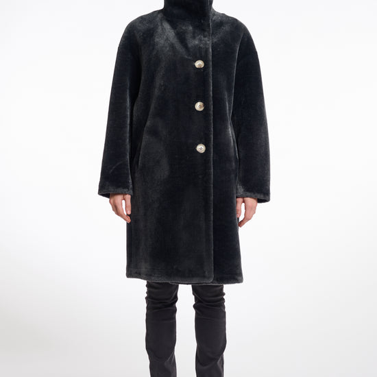 dark grey faux fur long line coat with stand neck and 3 button closure from rino and pelle