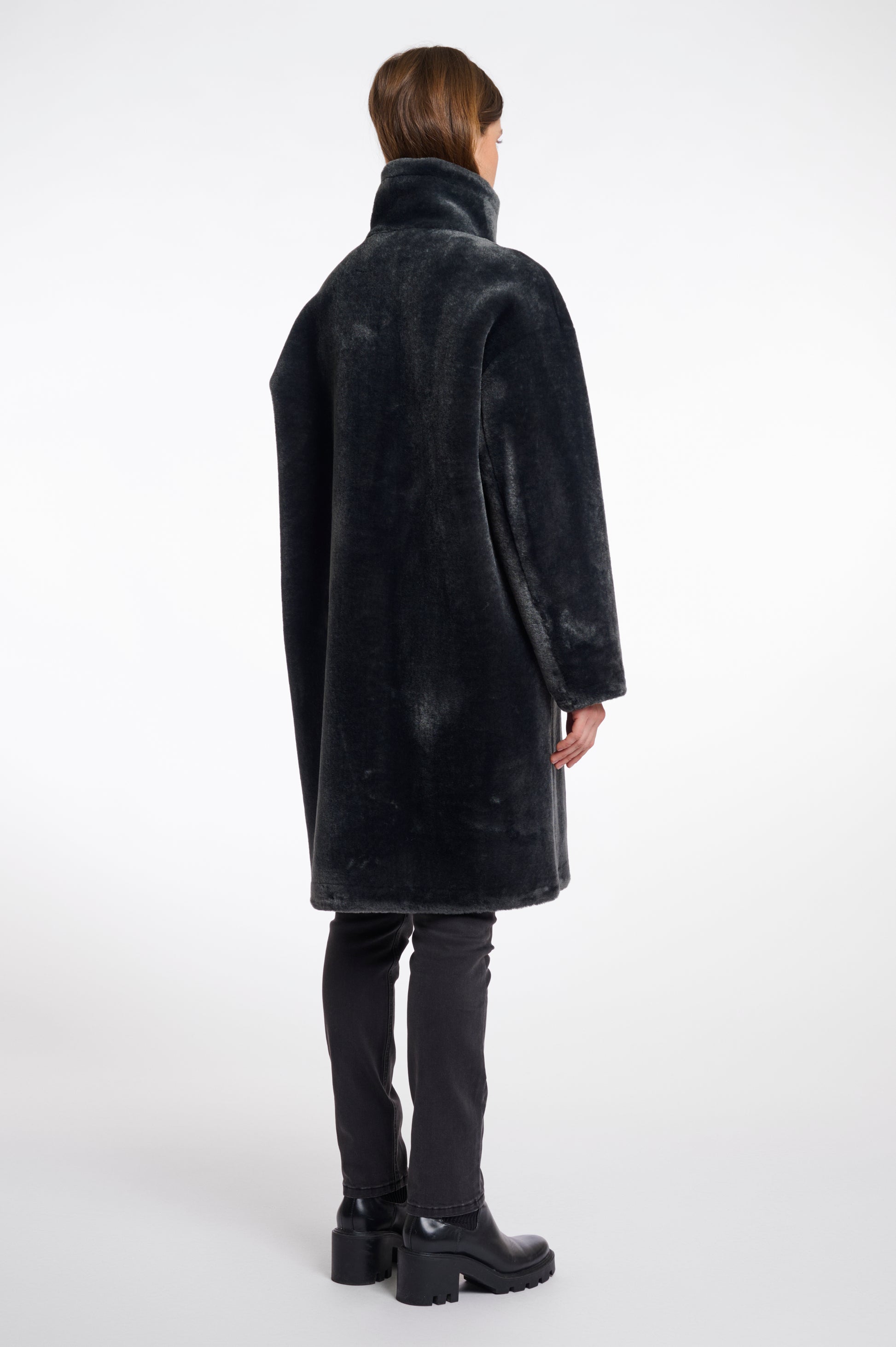 dark grey faux fur long line coat with stand neck and 3 button closure from rino and pelle rear view