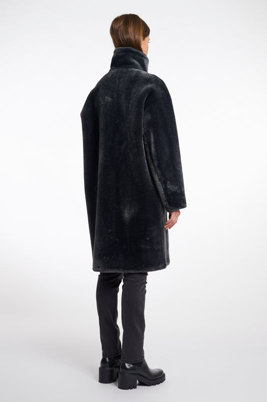 dark grey faux fur long line coat with stand neck and 3 button closure from rino and pelle rear view