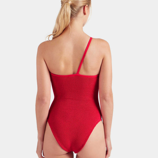 Red swimsuit worn by a model on a white background from Hunza G