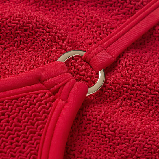 Close up detail of the fabrication of red swimsuit from Hunza G