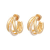 Claw hoop earring in gold plate with acrylic pearl details