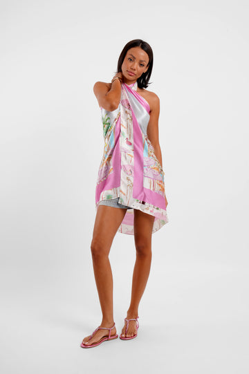 Woman wearing a colorful scarf on a white background