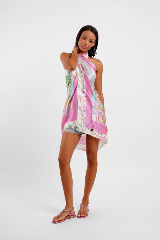 Woman wearing a colorful scarf on a white background