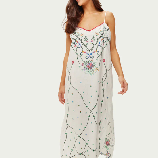 v neck spaghetti strap white linen cami  dress with embroidered detailing model