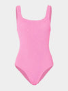 Pink swimsuit on a light gray background