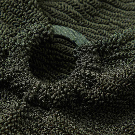 detail on green one size swimsuit