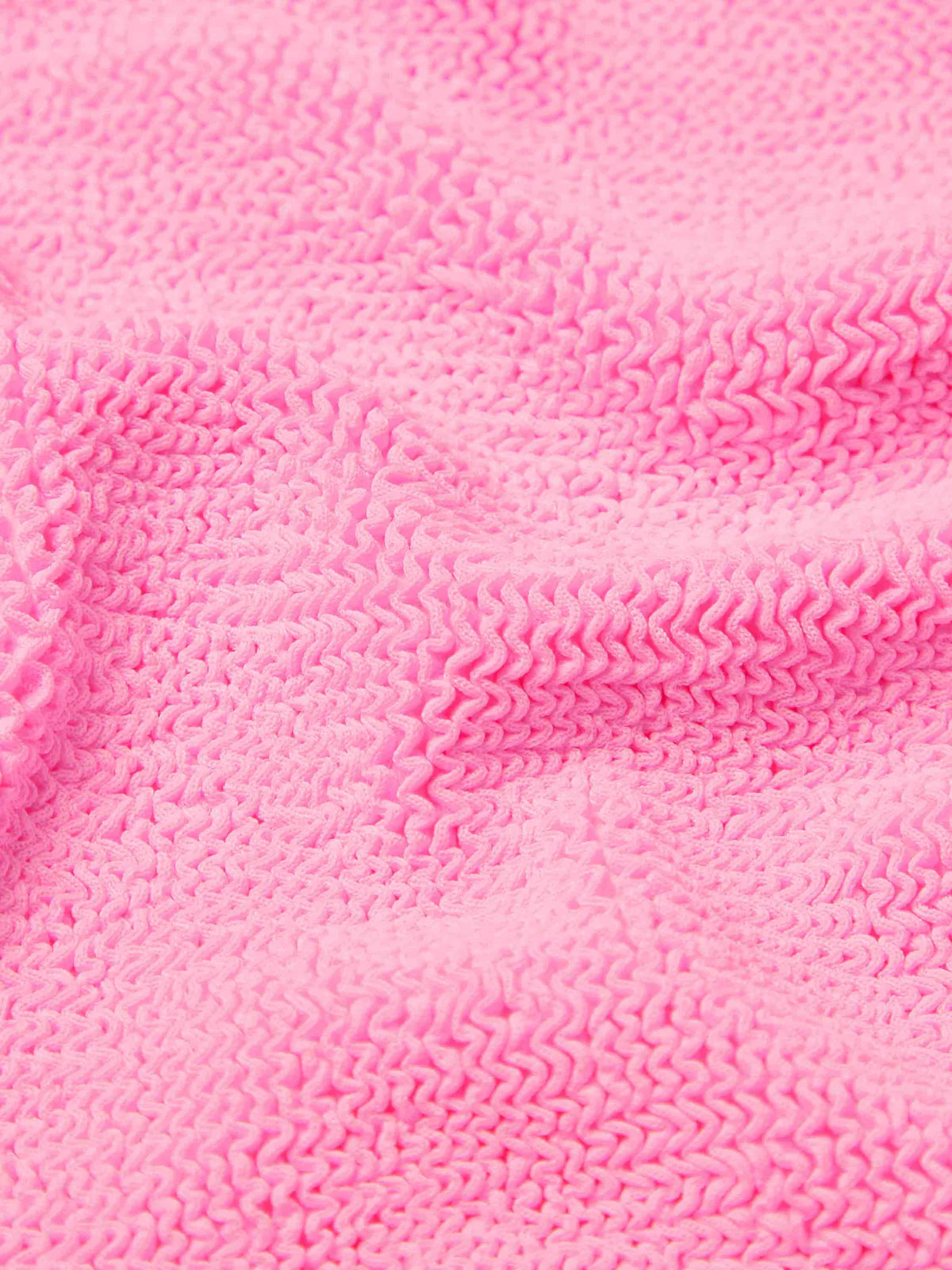 sqaure neck crinkle pink swimsuit from hunza g close up of fabric