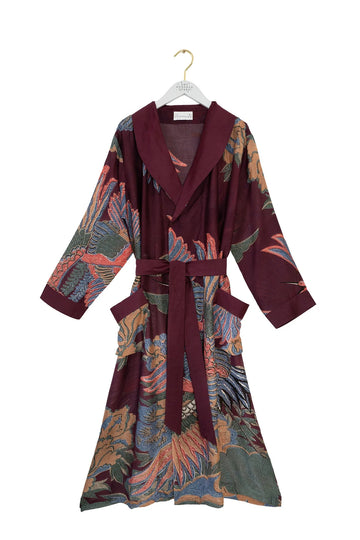 plum coloured dressing gown with vibrant crane print all over from one hundred stars