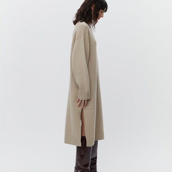 Beige wool dress with a funnel neck and long sleeves