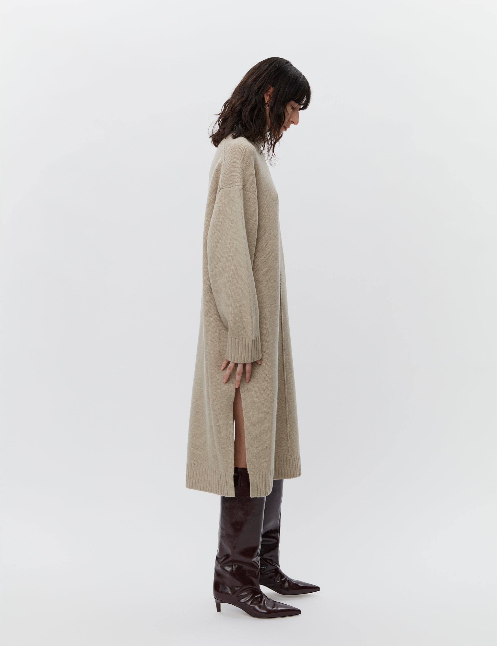 Beige wool dress with a funnel neck and long sleeves