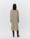 Beige wool dress with a funnel neck and long sleeves rear view