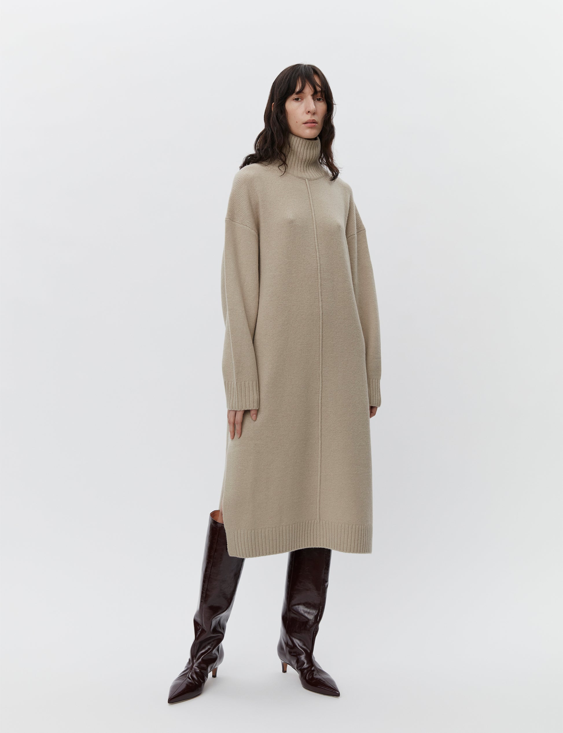 Beige wool dress with a funnel neck and long sleeves